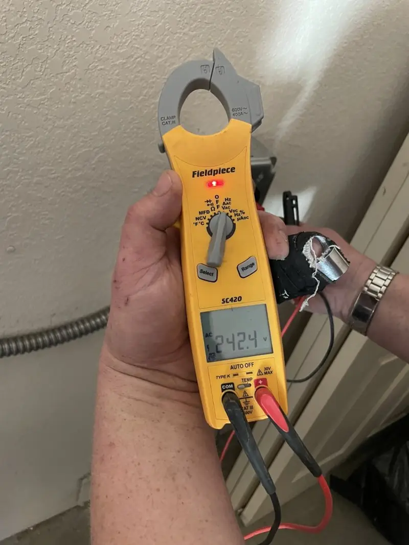 Voltage testing with clamp meter during Generator Installation in Savannah
